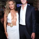 Paige Spiranac’s mystery boyfriend unmasked as banker who joined golf beauty on red carpet for Sports Illustrated party