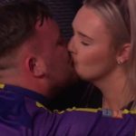 Luke Littler fights back tears as he celebrates historic Premier League Darts final win with kiss from girlfriend