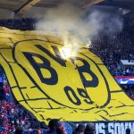 Watch as Dortmund fans’ tifo is set alight after ‘flares are thrown at it’ before Champions League semi-final vs PSG